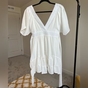 White flowy dress perfect for wedding/bachelorette festivities